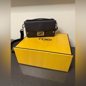 Fendi Baguette Soft Trunk
Dark grey ostrich leather bag (one of a kind)